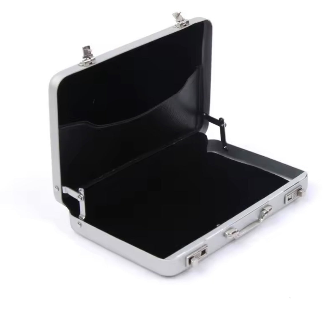 Silver briefcase open showing interior